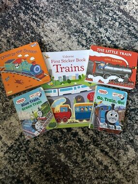 Usborne train sticker book, lot of train board books.